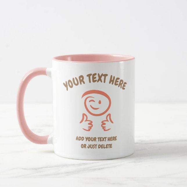 Taza La Emoji Winking Se Enfrenta A Dos Pulgares Arriba (Izquierda)