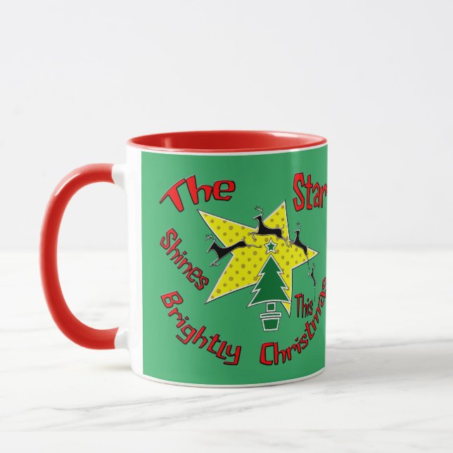 Taza La estrella brilla con fuerza a estos Navidades (Izquierda)