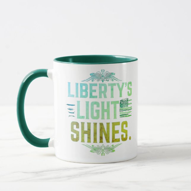 Taza La llama de la libertad ilumina el pantano nocturn (Izquierda)