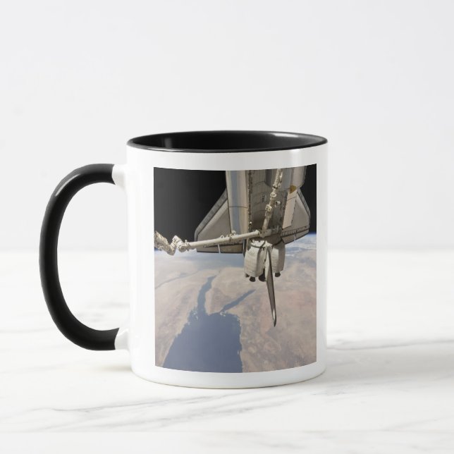 Taza La parte posterior de la lanzadera espacial acopla (Izquierda)