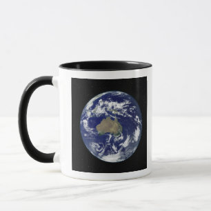 Taza La tierra completamente encendida se centró en
