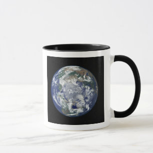 Taza La tierra completamente encendida se centró en el