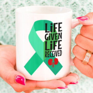 Taza La vida dada por la vida recibida trasplante de ri