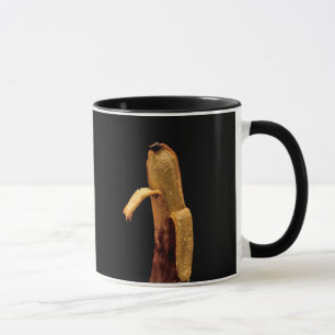 Taza La vida de la banana con medio despellejón