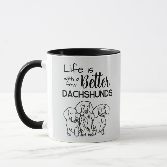 Taza La vida es mejor con unos cuantos garabatos de Dac (Izquierda)