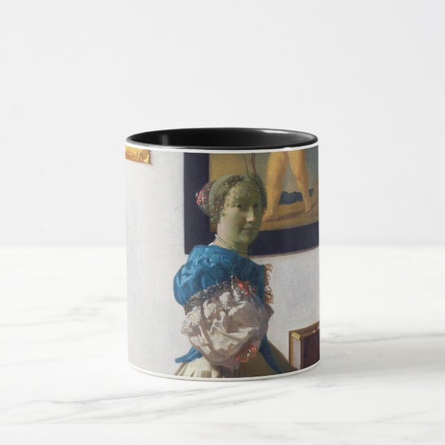 Taza Lady parada en un Virginal, Johannes Vermeer (Centro)