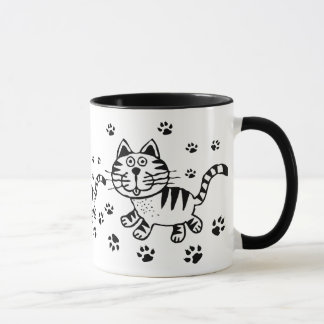 Taza linda de las impresiones del gato y de la