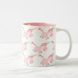 Taza linda de los unicornios del rosa del dibujo