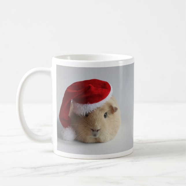 taza linda del conejillo de Indias de santa del (Izquierda)