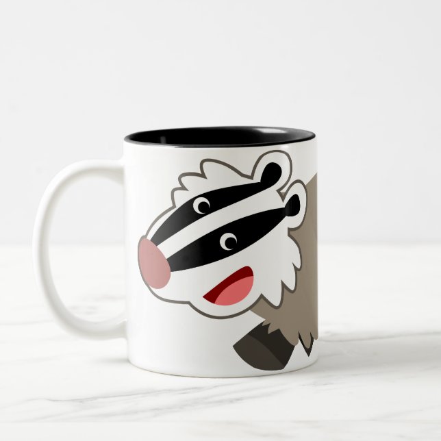 Taza linda del tejón del dibujo animado (Izquierda)