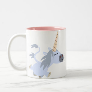 Taza linda del unicornio del dibujo animado el