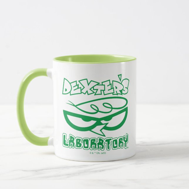 Taza Logo de la cara de laboratorio de Dexter (Izquierda)