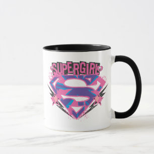 Taza Logotipo rosado y púrpura de Supergirl del Grunge