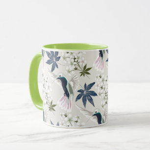 Taza Los colibríes y las flores blancas.