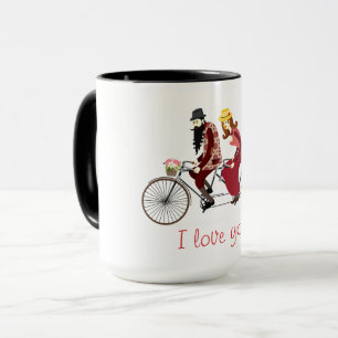 Taza Los pares cariñosos en una bicicleta en tándem
