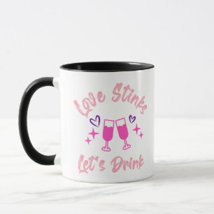 Taza Love Stinks Lets Drink