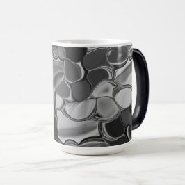 Taza Mágica Formas grises claras y redondeadas oscuras.