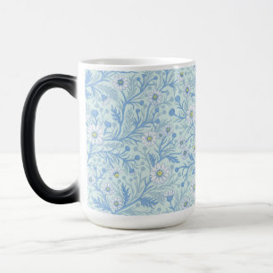 Taza Mágica Margaritas en blanco y azul sobre vidrio marino