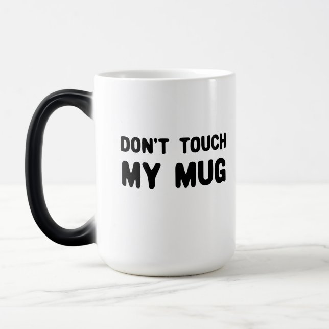 Taza Mágica No toques mi lema gracioso (Izquierda)