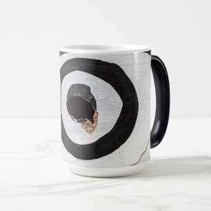 Taza Mágica objetivo se desgarra