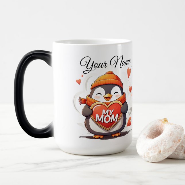 Taza Mágica Pingüino sonriente sosteniendo el signo cardíaco M (Con donut)