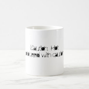 Taza Mágica Precaución