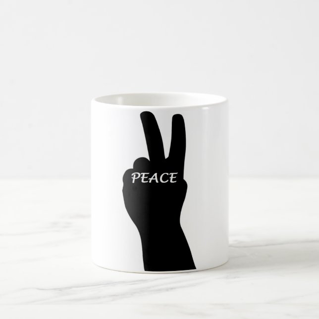 TAZA MÁGICA SEÑAL DE PAZ (Centro)