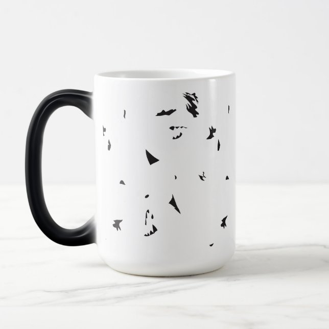Taza Mágica una foto en blanco y negro de un rebaño de aves (Izquierda)