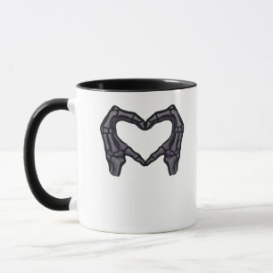 Taza Manos esqueléticas formando un corazón