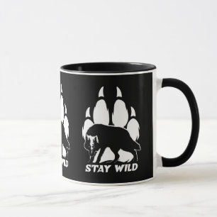 Taza Mantente salvaje: silueta de lobo y huella