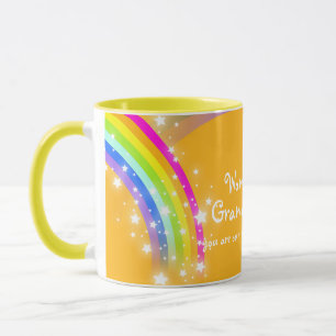 Taza maravillosa del naranja del arco iris de la