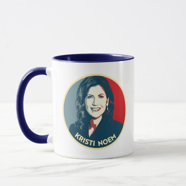 Taza Marca de propaganda KRISTI NOEM (Izquierda)
