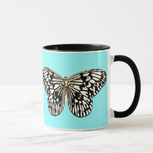 Taza Mariposa negra y blanca, fondo turquesa