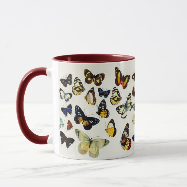 Taza MARIPOSAS BLANCAS AZULES ROJAS DE BELLEZA Naturale (Izquierda)