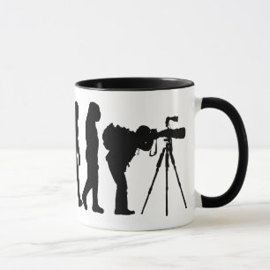 Taza masculina de la evolución del fotógrafo