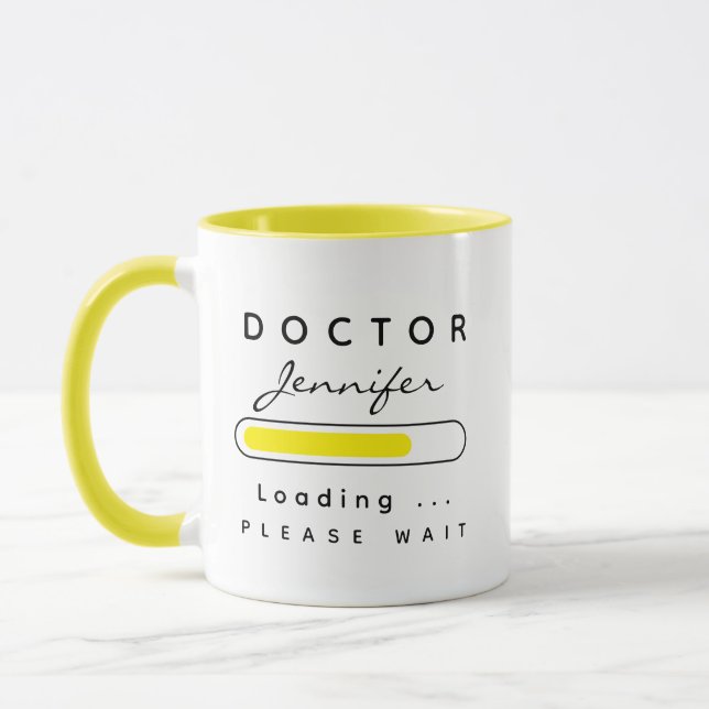 Taza MÉDICO [Nombre] Cargando amarillo y blanco (Izquierda)