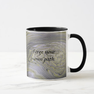 Taza metálica con cita inspiradora 'Forja tu propi