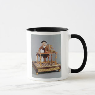 Taza Modelo de Benjamin Franklin en su tabla