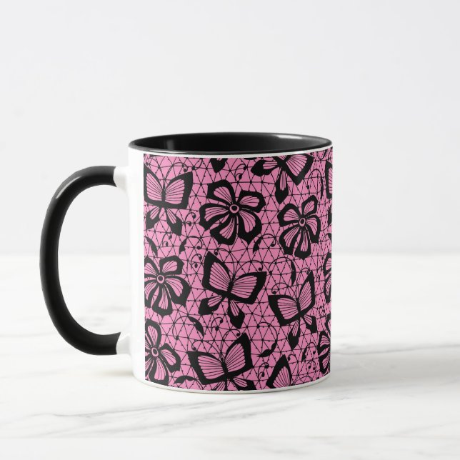 Taza modelo del cordón con las mariposas (Izquierda)
