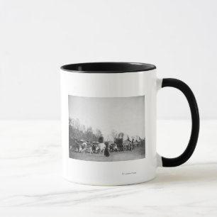 Taza Mujer y muchacho con Bullwhackers en tren del buey