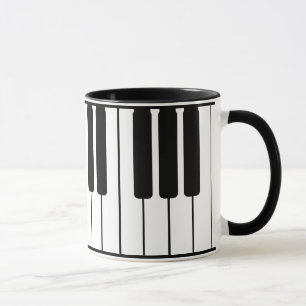 Taza Muñeca musical del teclado del piano