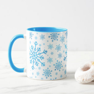Taza Navidades azules bonitos con copos de nieve en bla