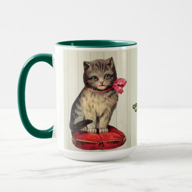 Taza Navidades Kitten sentados usando un sopa roja (Izquierda)