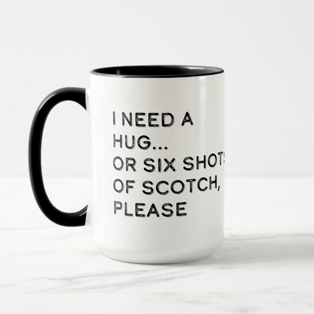 Taza Necesito un abrazo o seis disparos de whisky (Izquierda)