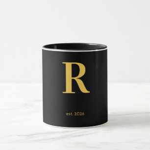Taza negra con letra dorada R Taza minimalista c