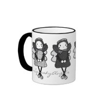 Taza negra y blanca de SqueakyAngels