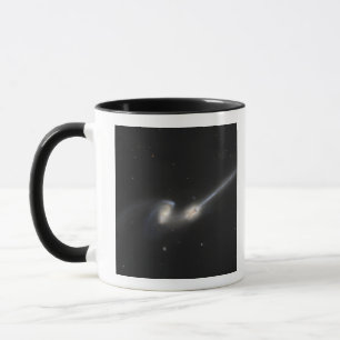 Taza NGC 4676, también conocida como las galaxias de ra