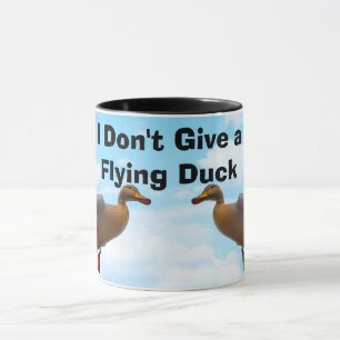 Taza No te des gracia a un pato volador