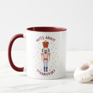 Taza Nueces sobre la música navideña de Tchaikovsky Nut