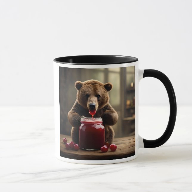 Taza Ours gourmand dévorant un pot de confiture. (Derecha)